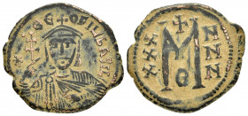 THEOPHILUS.(829-842).Constantinople.Follis.

Obv : ✷ • ΘЄO-FIL' ЬASIL.
Crowned and draped bust facing, holding patriarchal cross and akakia.

Rev : La...