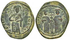 CONSTANTINE X DUCAS.(1059-1067).Constantinople.Follis.

Obv : +EMMA NOVHA.
Christ standing facing on footstool, wearing nimbus and holding Gospels, IC...