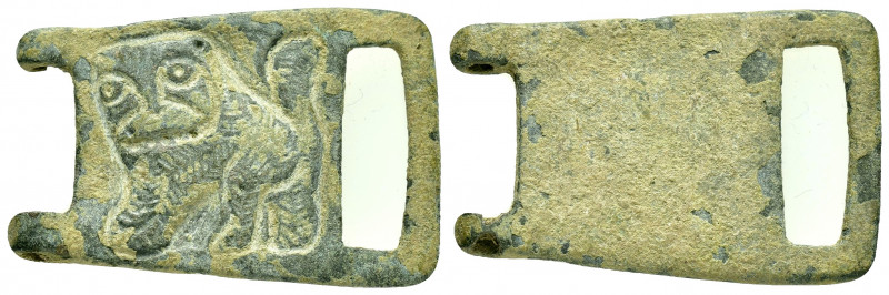 ROMAN BRONZE MILITARY BUCKLE.(1st-2nd century).Ae.

Obv : Standing lion left, ta...