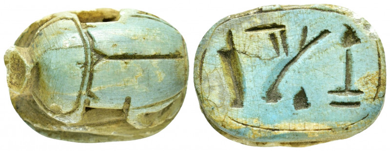 EGYPTIAN SCARAB.(Circa 1650-1550 BC).Faience.

Obv : Blue faience winged scarab....