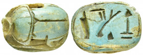 EGYPTIAN SCARAB.(Circa 1650-1550 BC).Faience.

Obv : Blue faience winged scarab.

Rev : Base is engraved with the throne name of ownner.

Condition : ...