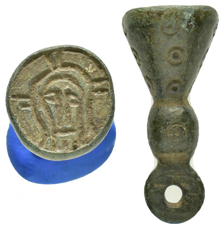 ANCIENT ROMAN BRONZE STAMP SEAL.(1st-2nd century).Ae.

Obv : Face.

Rev : Blank....