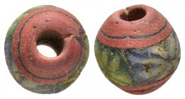 ANCIENT GLASS BEAD.

Obv : Blank.

Rev : Blank.

Condition : Good very fine.

Weight : 2.08 gr
Diameter : 11 mm