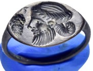 ANCIENT GREEK BRONZE RING.(1st-2nd century BC).Ae.

Obv : Head of Dionysos left, bunch of grapes .

Rev : Blank.

Condition : Good very fine.
...