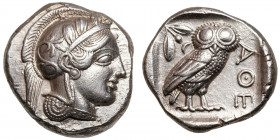 Attica, Athens.
AR Tetradrachm
17,22 g / 24 mm
~ 454-404 BCE
Helmeted head of Athena right, with frontal eye / Owl standing right, head facing, cl...