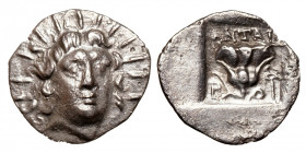 Caria, Rhodos.
AR Hemidrachm
1,12 g / 13 mm
Plinthophoric standard. Antaios, magistrate. ~ 125-88 BCE
Radiate head of Helios facing slightly right...