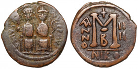 Justin II, with Sophia (565-578)
AE Follis
13,04 g / 31 mm
Nicomedia, RY 4 (568/9)
Justin and Sophia seated facing on double throne, holding globu...
