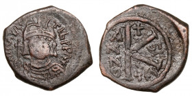 Maurice Tiberius (582-602)
AE Half Follis
5,20 g / 23 mm
Thessalonica
Helmeted and cuirassed facing bust, holding globus cruciger. / Large K, cros...