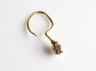 Roman Gold Earring
AV
0,67 g / 27 mm
~ 1st-4th century



Austrian collection, acquired at the European art market.
