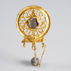 Roman Gold Earring
AV
1,91 g / 30 mm
~ 1st-3rd century
Stone/Glass in the center. One pendant missing.


Austrian collection, acquired at the E...