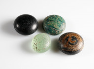 Roman Glass Gaming Tokens

15-18 mm
~ 1st-4th century
Four pieces


Austrian collection, acquired at the European art market.