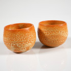 Two Seto Style Sake Cups

4,8 cm height, 6 cm width.
Showa Period (1926-1989)
Orange glaze.


Austrian collection, acquired at the European art...