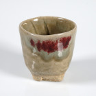 Seto Style Sake Cup

4,7 cm height, 4,8 cm width.
Taisho Period (1912-1926)
Red glaze.


Austrian collection, acquired at the European art mark...