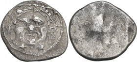 Greek Italy. Etruria, Populonia. AR 20-Asses, c. 300-250 BC. Obv. Facing head of Metus, tongue protruding, hair bound with diadem; below, oXI:[I]Xo. R...
