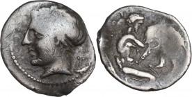 Greek Italy. Central and Southern Campania, Neapolis. AR Obol, c. 320-300 BC. Obv. Laureate head of male left; letter and symbol (?) behind neck. Rev....