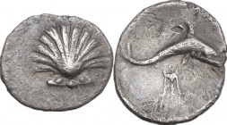 Greek Italy. Southern Apulia, Tarentum. AR Litra, c. 280-228 BC. Obv. Cockle shell. Rev. Dolphin right; below, tripod. HN Italy 1073; Vlasto 1530; SNG...