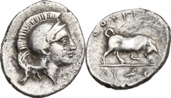 Greek Italy. Southern Lucania, Thurium. AR Triobol, c. 280-213 BC. Obv. Head of Athena right, wearing crested Attic helmet. Rev. Bull butting right; a...