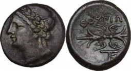Greek Italy. Southern Lucania, Thurium. AE 15 mm, c. 280-213 BC. Obv. Laureate head of Apollo left. Rev. ΘOYPIΩ[Ν] Winged thunderbolt; monogram below....
