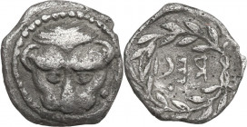 Greek Italy. Bruttium, Rhegion. AR Litra, c. 445-435 BC. Obv. Facing lion's head. Rev. RECI (retrograde) in olive wreath. HN Italy 2479; HGC 1 1650. A...