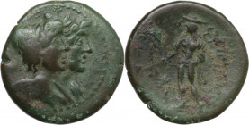 Greek Italy. Bruttium, Rhegion. AE Triens, c. 215-150 BC . Obv. Jugate busts of the Dioskouroi right. Rev. ΠΗΓΙΝΩΝ. Hermes standing left, holding bran...