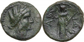 Sicily. Akrai. AE 22 mm, after 210 BC. Obv. Wreathed head of Persephone right. Rev. Demeter standing left, holding torch and sceptre; ethnic around. H...