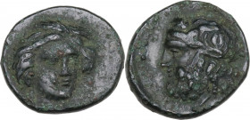 Sicily. Gela. AE 14.5 mm, c. 315-310 BC. Obv. Head of Demeter facing slightly right, wearing wreath of grain. Rev. Head of Gelas left, horned, wearing...