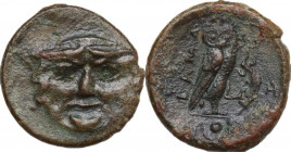 Sicily. Kamarina. AE Onkia, c. 420-410 BC. Obv. Gorgoneion facing, tongue slightly protruding. Rev. KAMA. Owl standing right, head facing, grasping li...