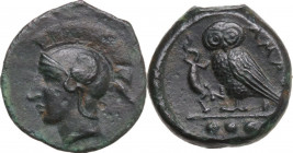 Sicily. Kamarina. AE Tetras, c. 410-405 BC. Obv. Head of Athena left, wearing crested Corinthian helmet decorated with a wing. Rev. KAMA (retrograde)....