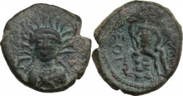 Sicily. Leontini. AE 22 mm, c. 204-180 BC. Obv. Facing bust of Demeter, wearing wreath of radiate leaves; plow to left. Rev. ΛΕΟΝΤΙΝΩΝ. River god seat...