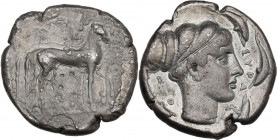 Sicily. Syracuse. Second Democracy (466-405 BC). AR Tetradrachm, c. 450-439 BC. Obv. Charioteer driving slow quadriga right, holding kentron and reins...