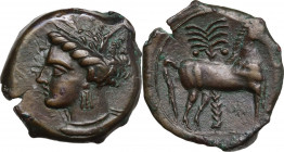 Punic Sardinia. AE 16.5 mm. c. 360-330 BC, uncertain mint. Obv. Wreathed head of Kore left, wearing triple-pendant earring. Rev. Horse standing right;...