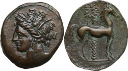Punic Sardinia. AE 17 mm. c. 360-330 BC, uncertain mint. Obv. Wreathed head of Kore left, wearing triple-pendant earring. Rev. Horse standing right; i...