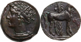 Punic Sardinia. AE 16 mm. c. 360-330 BC, uncertain mint. Obv. Wreathed head of Kore left, wearing triple-pendant earring. Rev. Horse standing right; i...