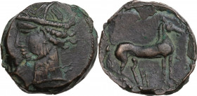 Punic Sardinia. AE Shekel, uncertain mint, c. 264-238 BC. Obv. Wreathed head of Kore left, wearing triple-pendant earring. Rev. Horse standing right; ...