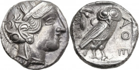 Continental Greece. Attica, Athens. AR Tetradrachm, c. 454-404 BC. Obv. Head of Athena right, wearing earring, necklace, and crested Attic helmet deco...