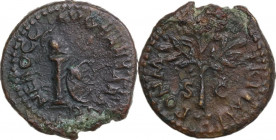 Nero (54-68). AE Quadrans, Rome mint, 62 AD. Obv. NERO CLAVD CAESAR AVG. Column, upon which rests a crested helmet, spear behind, round shield leaning...
