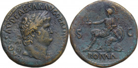 Nero (54-68). AE Sestertius, Lugdunum mint. Obv. NERO CLAVD CAESAR AVG GER PM [ ]. Laureate head right. Rev. ROMA SC. Roma, seated left on cuirass, ho...