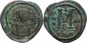 Justinian I (527-565). AE 40 Nummi – Follis. Constantinople mint, 2nd officina. Dated RY 12 (538/9). Obv. D N IVSTINI ANVS P P AVC. Helmeted and cuira...