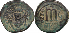 Tiberius II Constantine (578-582). AE Follis. Nicomedia mint, 2nd officina. Dated RY 7 (580/1). Obv. [DN] TIb CONs-TANT [PP AY]. Crowned bust facing, ...