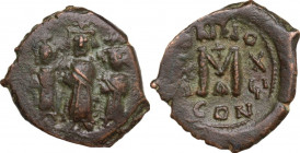 Heraclius (610-641). AE Follis, Constantinople mint. Obv. Heraclius between Heraclius Constantine and the empress Martina, all standing facing; each h...