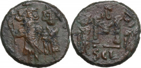 Constans II, with Constantine IV, Heraclius, and Tiberius (641-668). AE Follis, Syracuse mint, 659-668. Obv. Constans, bearded and holding long cross,...