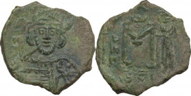 Constantine IV Pogonatus (668-685). AE Follis. Syracuse mint. Struck 674-681 AD. Obv. Helmeted and cuirassed bust facing slightly right, wearing short...