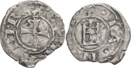 Genova. Repubblica (1139-1339). Denaro. CNI 69; MIR (Piem. Sard. Lig. Cors.) 16. MI. 0.54 g. 16.50 mm. Irregolarità del tondello. BB.