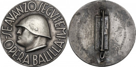Benito Mussolini (1883-1945), Duce d'Italia. Spilla Opera Balilla -SE AVANZO SEGUITEMI-. MB. 38.00 mm. Prodotta F. M. LORIOLI & CASTELLI. SPL.