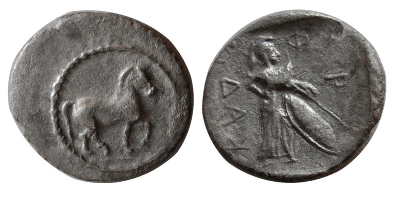 THESSALY, Pharcadon. 450-400 BC. AR Obol (0.77 gm; 12 mm). Obv. Horse walking ri...