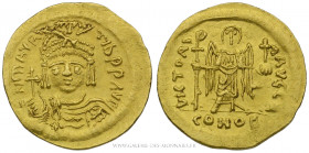 MAURICE TIBÈRE (582-602), Solidus frappé à Constantinople, (Or - 4,45 g - 21,4 mm - 6h)
A/ DN MAVR - TIB PP AVG. Buste casqué de Maurice Tibère de fa...