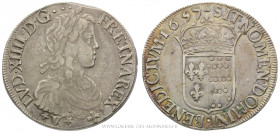 LOUIS XIV (1643-1715), Écu de Navarre à la mèche longue 1657 *V* Saint-Palais, (Argent - 27,03 g - 39 mm - 6h)
A/ Buste du Roi enfant lauré, cuirassé...