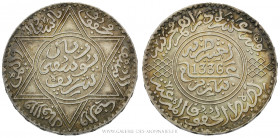 MAROC, Moulay Yussef Ier (1912-1927), 10 DIRHAMS (1 Rial) 1336 AH (1917) Paris, (Argent - 24,93 g - 37,6 mm - 12h)
A/ Cercle avec inscriptions et dat...