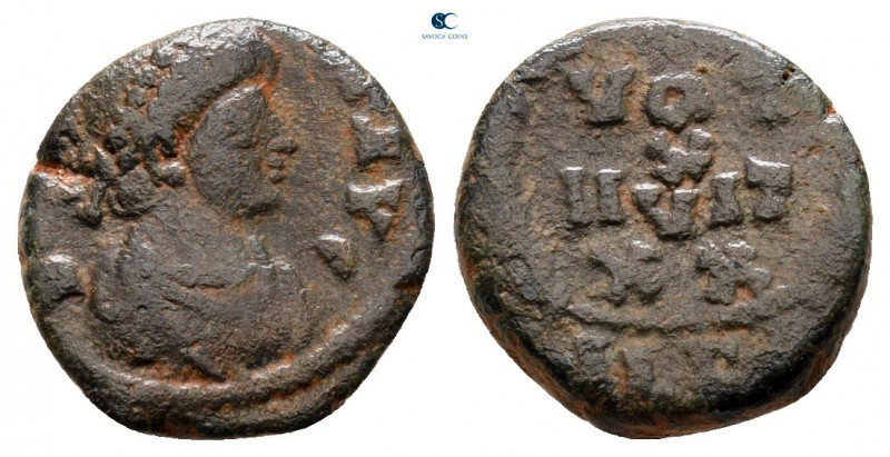 Theodosius II AD 402-450. Uncertain mint
Nummus Æ

11 mm, 1,29 g



nearl...