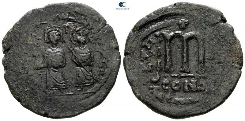 Phocas, with Leontia AD 602-610. Constantinople
Follis or 40 Nummi Æ

33 mm, ...